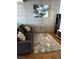 Chic living area with modern art and a comfortable gray couch at 353 E Bonneville Ave # 631, Las Vegas, NV 89101