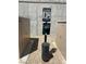 Exterior pet station with bag dispenser and trash can, reminding residents to clean up after their pets at 353 E Bonneville Ave # 631, Las Vegas, NV 89101