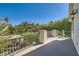 Outdoor balcony featuring iron railing and lovely views at 3560 Five Pennies Ln, Las Vegas, NV 89120