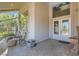 Inviting front porch with comfortable seating and elegant details, offering a warm welcome to guests at 3560 Five Pennies Ln, Las Vegas, NV 89120