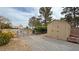 Spacious backyard with a storage shed and fenced area, perfect for outdoor activities at 3580 Unicorn Ave, Pahrump, NV 89048