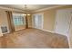 Cozy dining room with elegant lighting and views to the backyard at 3580 Unicorn Ave, Pahrump, NV 89048