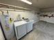 Practical laundry room equipped with new washer, dryer, and water heater at 3580 Unicorn Ave, Pahrump, NV 89048