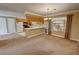 Open living space next to kitchen, offering a seamless flow for modern living at 3580 Unicorn Ave, Pahrump, NV 89048