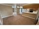 Open living space with breakfast bar, creating a welcoming and functional layout at 3580 Unicorn Ave, Pahrump, NV 89048