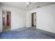 Spacious bedroom with neutral carpet and view of the adjacent bathroom at 3934 Sir Payne Ct, Las Vegas, NV 89104