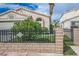 Charming single-story home with landscaped front yard and secure black metal fence at 3934 Sir Payne Ct, Las Vegas, NV 89104