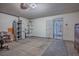 This garage offers storage shelves, water heater and an access door to the property at 3934 Sir Payne Ct, Las Vegas, NV 89104