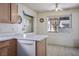 Bright kitchen features an adjacent dining area with backyard access at 3934 Sir Payne Ct, Las Vegas, NV 89104