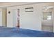 Open concept living space with access to kitchen and tiled dining area at 3934 Sir Payne Ct, Las Vegas, NV 89104
