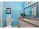 Charming bathroom with granite counter, bright lighting, and tiled flooring at 5010 Mick Pl, Las Vegas, NV 89103