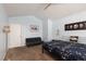 Relaxing bedroom with modern ceiling fan and seating area, perfect for unwinding at 5010 Mick Pl, Las Vegas, NV 89103