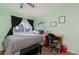 Cozy bedroom with a window and desk perfect for a study or home office at 5010 Mick Pl, Las Vegas, NV 89103