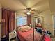 Serene bedroom with a four-poster bed, soft lighting, and cozy decor at 5250 S Rainbow Blvd # 1131, Las Vegas, NV 89118