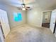 Bedroom with carpet, ceiling fan and window at 5250 S Rainbow Blvd # 1131, Las Vegas, NV 89118