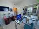 Bedroom featuring a functional workspace and mirrored closet doors, ideal for a home office at 5250 S Rainbow Blvd # 1131, Las Vegas, NV 89118