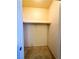 A walk-in closet with a single rod and carpet at 5250 S Rainbow Blvd # 1131, Las Vegas, NV 89118