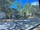 Apartment complex with well-maintained landscaping and mature trees along the street at 5250 S Rainbow Blvd # 1131, Las Vegas, NV 89118