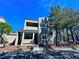 Charming two-story condo with a balcony, landscaped front yard, and a well-maintained exterior at 5250 S Rainbow Blvd # 1131, Las Vegas, NV 89118
