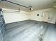 A clean garage with concrete floors and a white door at 5250 S Rainbow Blvd # 1131, Las Vegas, NV 89118