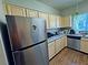 Modern kitchen with stainless steel refrigerator and ample counter space at 5250 S Rainbow Blvd # 1131, Las Vegas, NV 89118
