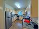 Well-lit kitchen featuring stainless steel appliances and plenty of cabinet space at 5250 S Rainbow Blvd # 1131, Las Vegas, NV 89118