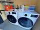Modern side-by-side washer and dryer in a compact laundry area at 5250 S Rainbow Blvd # 1131, Las Vegas, NV 89118
