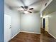 Bright living room with ceiling fan and wood-look floors, offering a modern and comfortable space at 5250 S Rainbow Blvd # 1131, Las Vegas, NV 89118