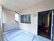 Outdoor patio area featuring a doorway, window, and stucco wall, creating a private entry space at 5250 S Rainbow Blvd # 1131, Las Vegas, NV 89118
