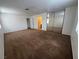 Large bedroom with mirrored closet and carpet flooring at 5253 Westwind Rd, Las Vegas, NV 89118
