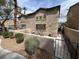Charming two-story home featuring landscaped yard and cozy patio area at 5253 Westwind Rd, Las Vegas, NV 89118