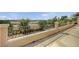 Balcony featuring a wrought iron railing and view of the desert landscape at 549 Via Balizan Ave, Las Vegas, NV 89123