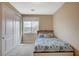 This bedroom features a window, closet, and neutral decor at 549 Via Balizan Ave, Las Vegas, NV 89123