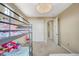 Bright bedroom featuring a bunk bed, closet with white sliding doors and neutral walls for a clean look at 549 Via Balizan Ave, Las Vegas, NV 89123