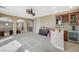 Spacious bonus room with a wet bar, carpeting, ample storage and natural light at 549 Via Balizan Ave, Las Vegas, NV 89123
