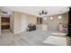Well-lit bonus room with carpet floors, neutral walls, a wet bar and access to the outside at 549 Via Balizan Ave, Las Vegas, NV 89123