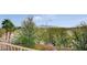 Scenic mountain views surround this home; lush trees and foliage add to the property's appeal at 549 Via Balizan Ave, Las Vegas, NV 89123