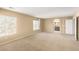 Generous carpeted bedroom with natural light, large windows, and neutral walls at 5518 Ovando Way, Las Vegas, NV 89122