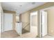 Upstairs hallway with carpet, and white trim at 5518 Ovando Way, Las Vegas, NV 89122