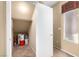 Organized storage space featuring shelving, bins, and a window for natural light at 5518 Ovando Way, Las Vegas, NV 89122