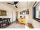 Cozy bedroom with wood floors, enhanced by natural light and stylish decor at 5570 N Nopah Vista Ave, Pahrump, NV 89060