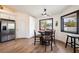 Cozy breakfast nook featuring a ceiling fan, views to the exterior, and built-in storage at 5570 N Nopah Vista Ave, Pahrump, NV 89060