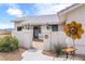 Charming courtyard entrance with pillars, custom lighting, and desert-friendly landscaping at 5570 N Nopah Vista Ave, Pahrump, NV 89060
