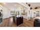 Spacious open-concept living area with a kitchen island, dining area, and seating at 5570 N Nopah Vista Ave, Pahrump, NV 89060