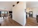 Open-concept living room with a fireplace, connected to a dining area and modern kitchen at 5570 N Nopah Vista Ave, Pahrump, NV 89060