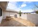 Outdoor patio with seating area, grill, and enclosed walls, perfect for entertaining at 5570 N Nopah Vista Ave, Pahrump, NV 89060