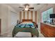 Charming bedroom with a comfortable bed, side tables, and natural light at 5578 River Highlands Pl, Las Vegas, NV 89122