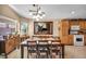 Dining area with a large table, chairs and a kitchen view at 5578 River Highlands Pl, Las Vegas, NV 89122