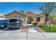 Charming single-story home boasts a well-manicured front yard, desert landscaping, and inviting curb appeal at 5578 River Highlands Pl, Las Vegas, NV 89122