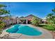Stunning backyard pool with an outdoor patio area, perfect for relaxing and entertaining under the sun at 5578 River Highlands Pl, Las Vegas, NV 89122